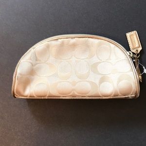 Small COACH gold cosmetic bag